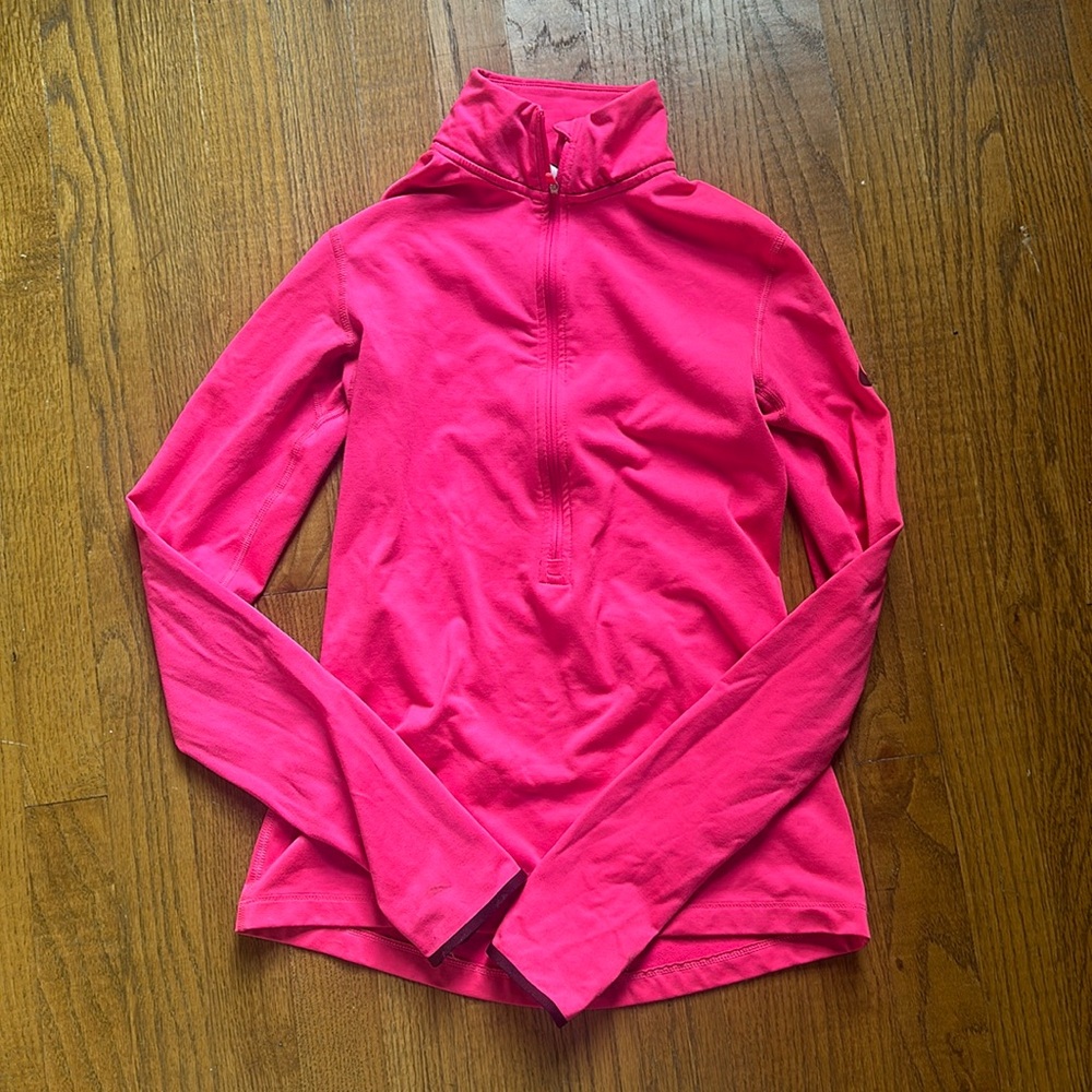 Pink 3/4 zip Nike pullover jacket Lightweight. Small spot on right sleeve wrist